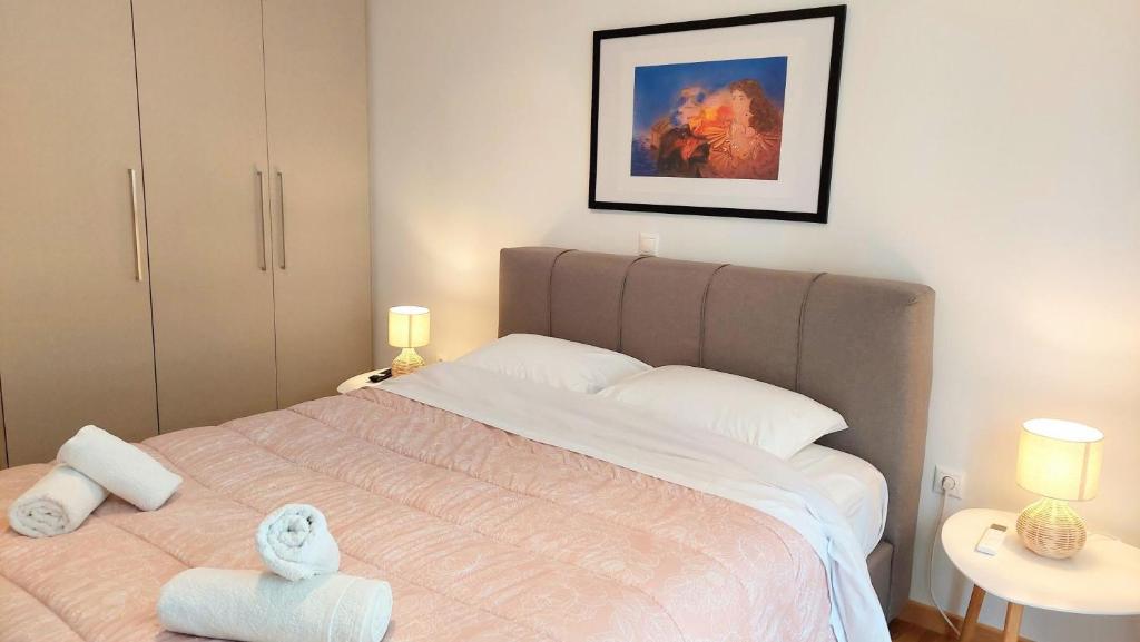 Posteľ alebo postele v izbe v ubytovaní Wonderful apartment in Acropolis