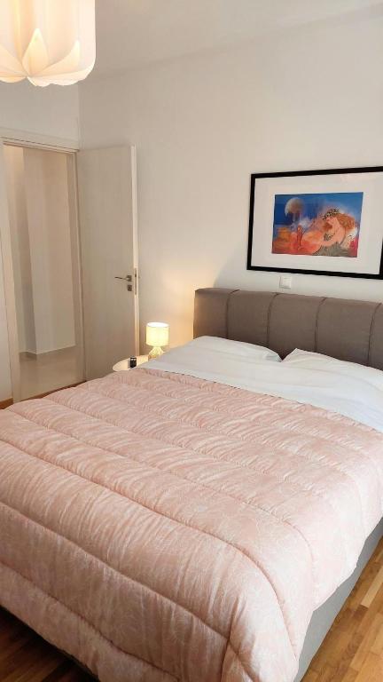 Posteľ alebo postele v izbe v ubytovaní Wonderful apartment in Acropolis