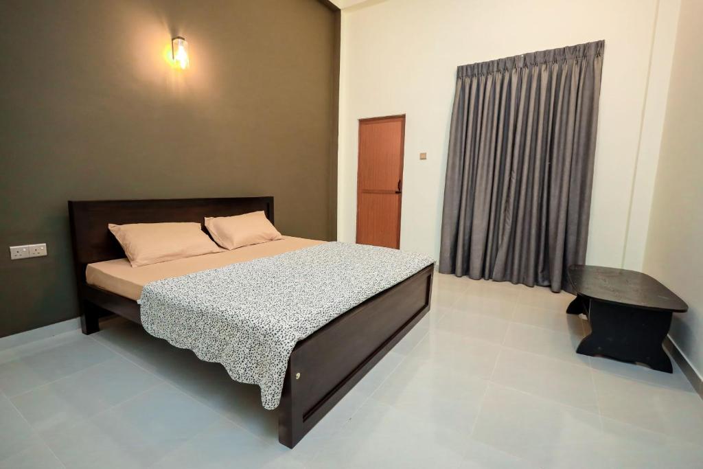 Postel nebo postele na pokoji v ubytování Negombo 146 Homestay
