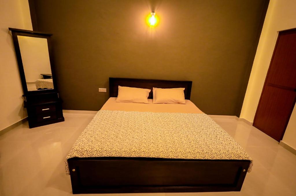 Postel nebo postele na pokoji v ubytování Negombo 146 Homestay