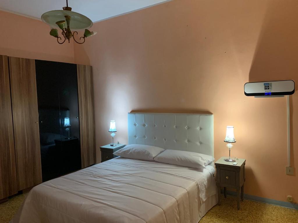 Postel nebo postele na pokoji v ubytování PRINCIPE ROOMS
