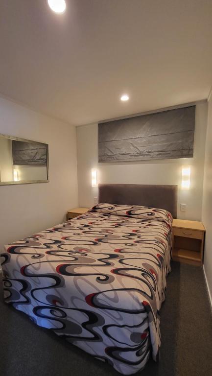Postel nebo postele na pokoji v ubytování Manukau Motor Lodge