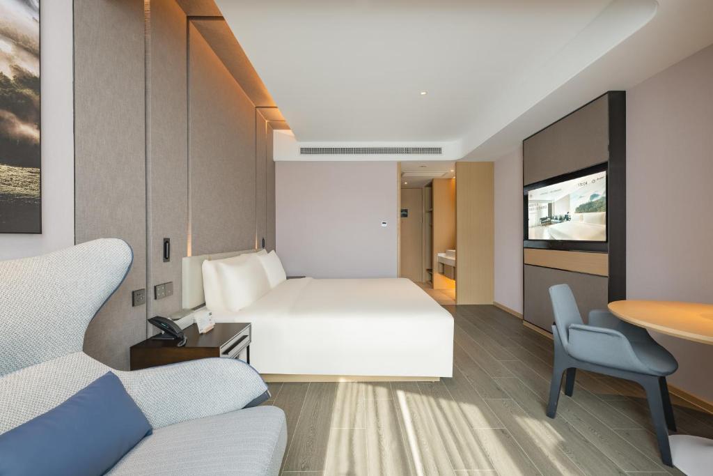 Postel nebo postele na pokoji v ubytování Atour Hotel Shanghai Jiading Juyuan Wisdom Center