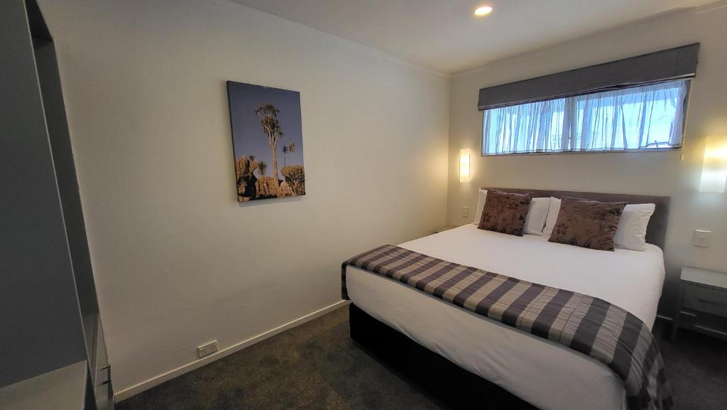 Postel nebo postele na pokoji v ubytování Manukau Motor Lodge
