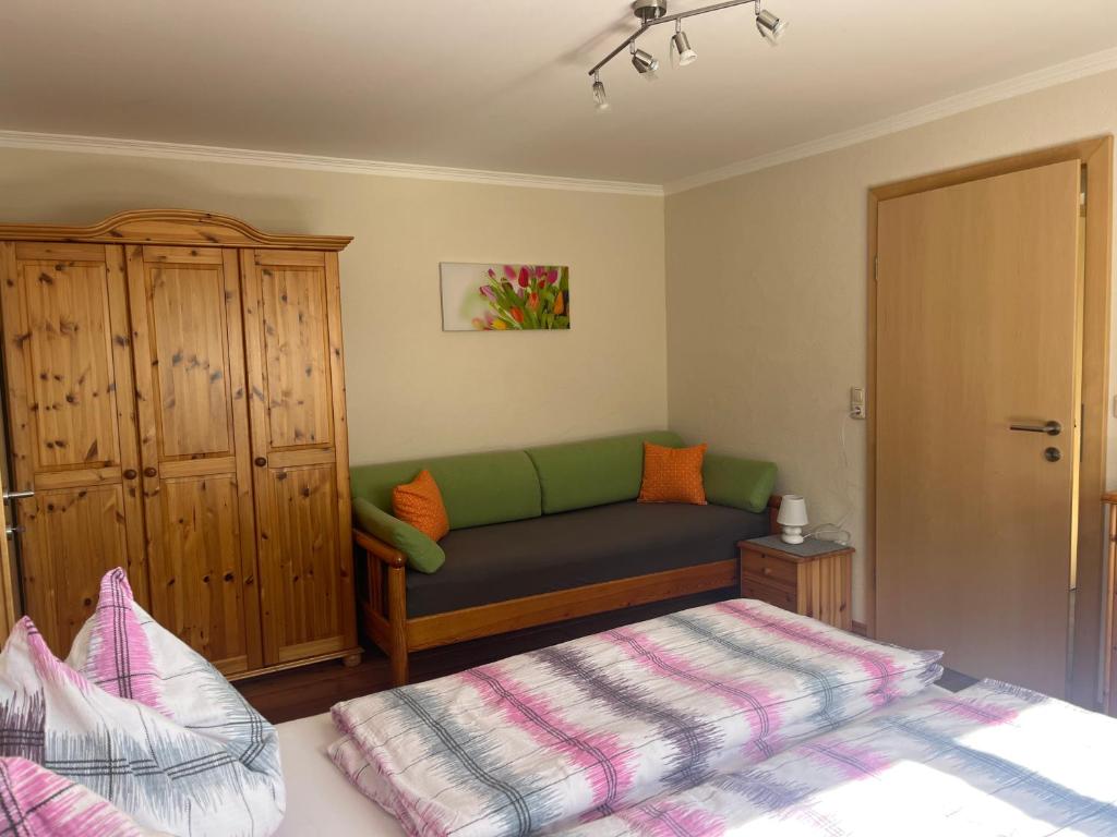 A bed or beds in a room at Landhaus Ganzer