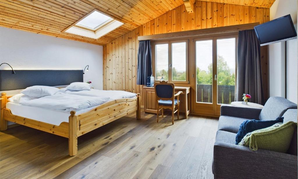 Postel nebo postele na pokoji v ubytování Bergblick Lodge - 3 Sterne Garni - Neueröffnung