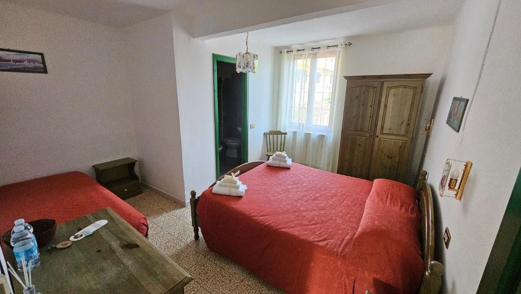 Postel nebo postele na pokoji v ubytování Casa Gaggiola