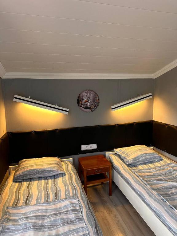 Postel nebo postele na pokoji v ubytování Guest house “Tamari’s”
