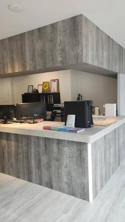 Kuchyň nebo kuchyňský kout v ubytování Meworld Hotel - Ximen