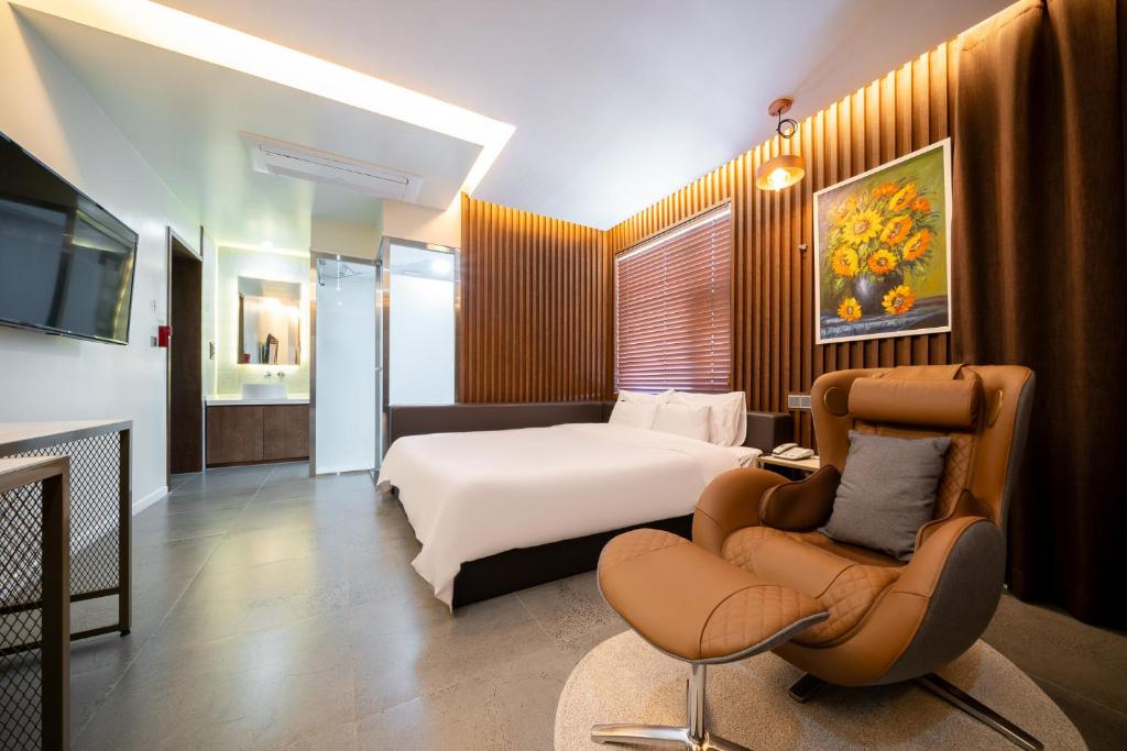 Postel nebo postele na pokoji v ubytování Suncheon Hound Hotel Suncheon Station Branch