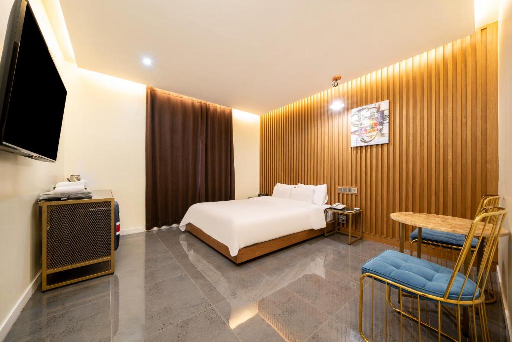 TV a/nebo společenská místnost v ubytování Suncheon Hound Hotel Suncheon Station Branch