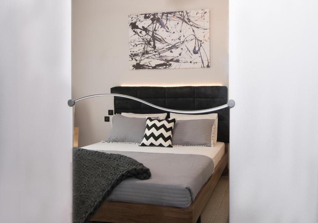 Ένα ή περισσότερα κρεβάτια σε δωμάτιο στο Sunny Garden Apartment