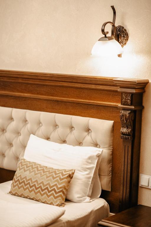 Postel nebo postele na pokoji v ubytování Hotel Imperial House