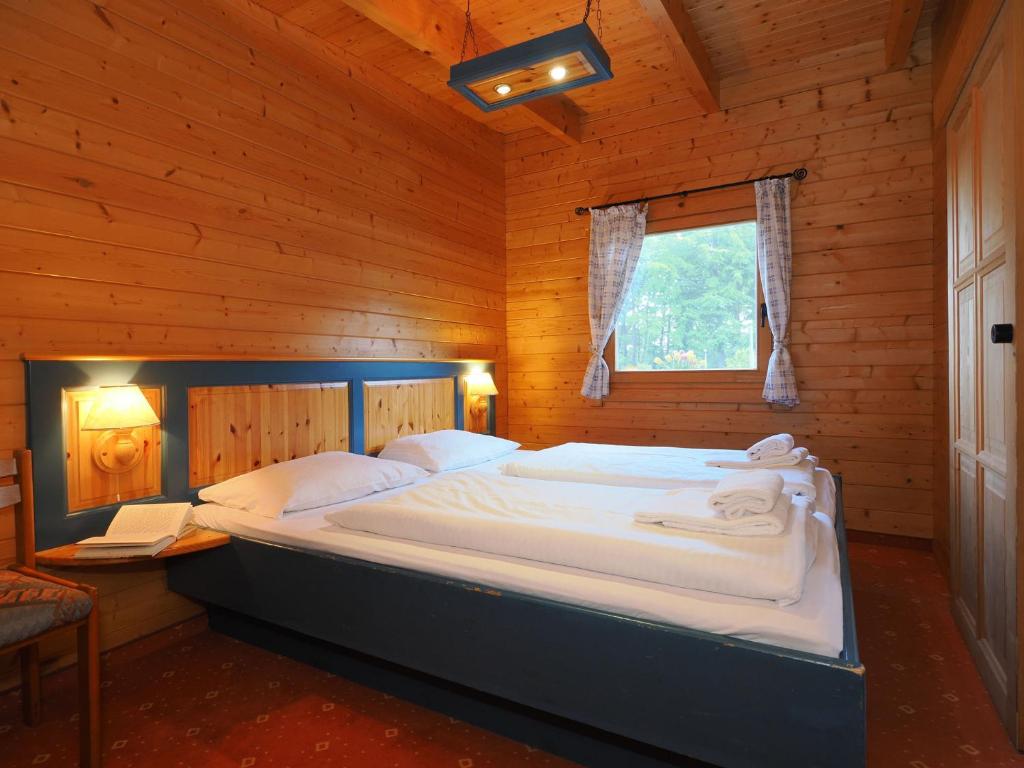 Postel nebo postele na pokoji v ubytování Forsthaus Langenberg
