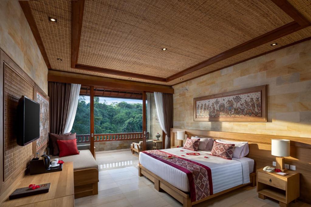 Postel nebo postele na pokoji v ubytování Pita Maha Resort & Spa