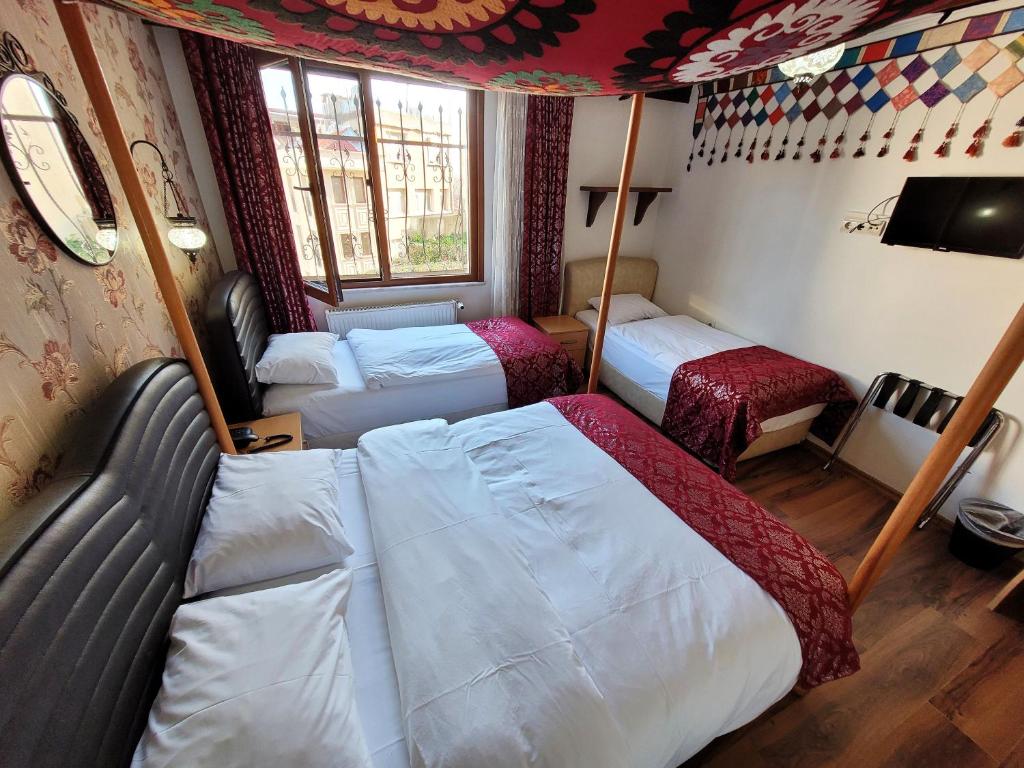 Postel nebo postele na pokoji v ubytování Marmara Guesthouse