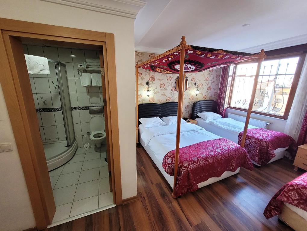 Postel nebo postele na pokoji v ubytování Marmara Guesthouse