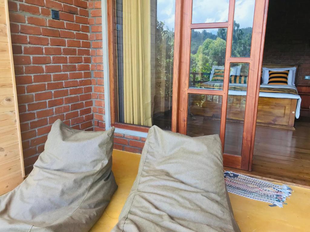 Postel nebo postele na pokoji v ubytování Ridge View Guest House -Ella