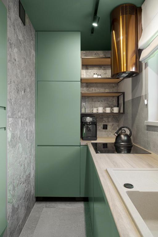 Kuchyňa alebo kuchynka v ubytovaní Apartament nad morzem