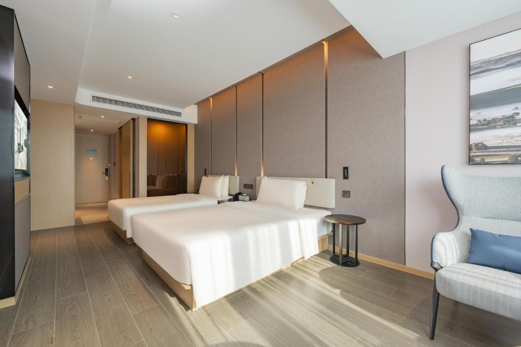 Postel nebo postele na pokoji v ubytování Atour Hotel Shanghai Jiading Juyuan Wisdom Center