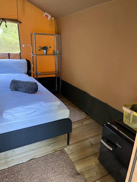 Postel nebo postele na pokoji v ubytování Delta Glamping