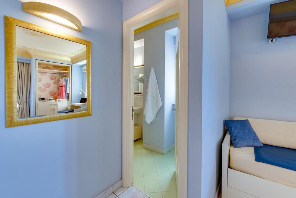 Postel nebo postele na pokoji v ubytování Fazio Rooms