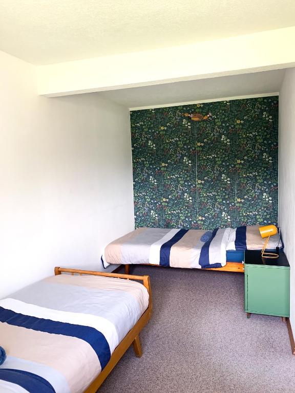 Postel nebo postele na pokoji v ubytování Apartmánový dům Horní Vltavice
