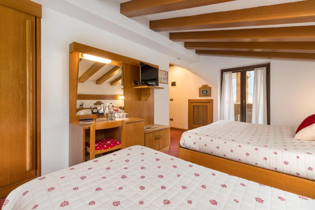 Postel nebo postele na pokoji v ubytování Hotel Bellavista