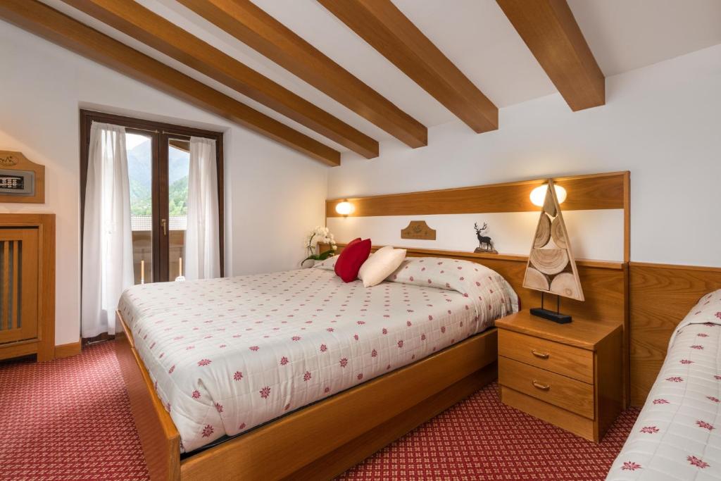 Postel nebo postele na pokoji v ubytování Hotel Bellavista