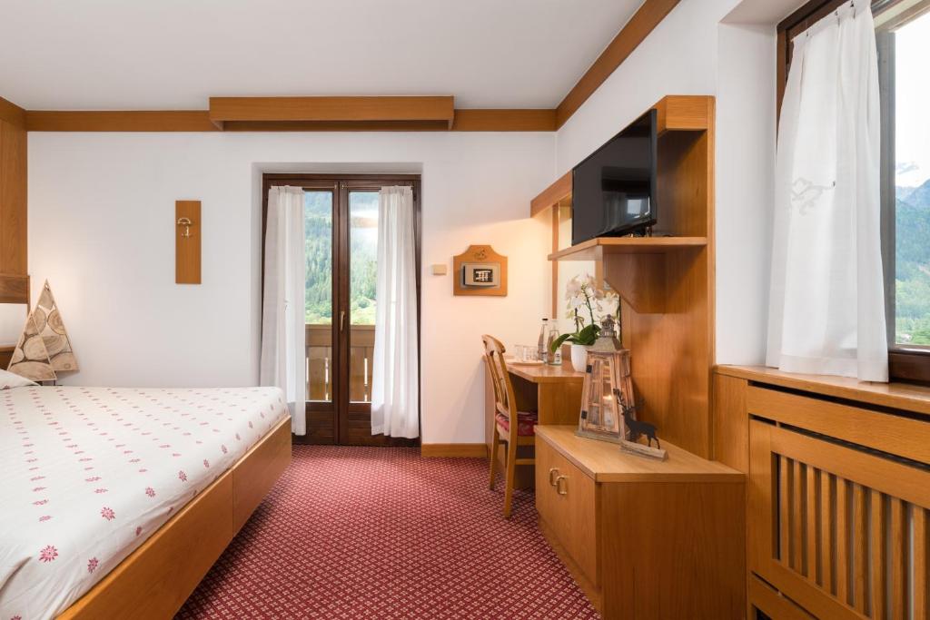 Postel nebo postele na pokoji v ubytování Hotel Bellavista