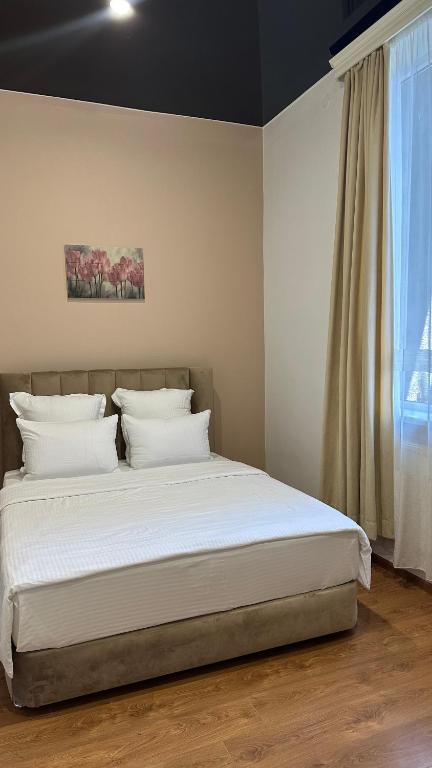 Postel nebo postele na pokoji v ubytování Wald Hotel Lagodekhi