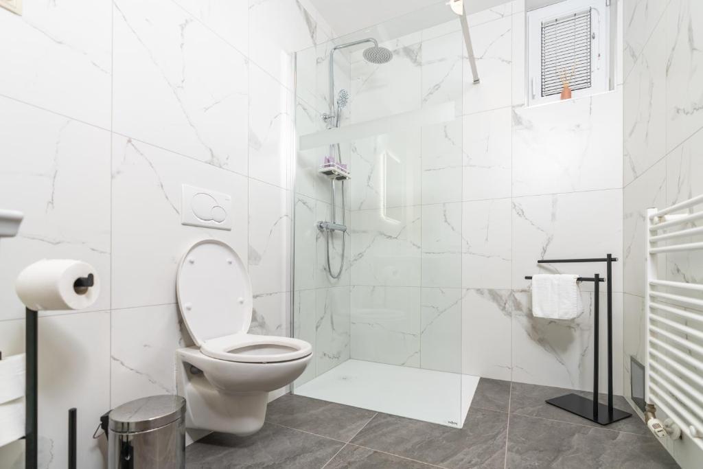 Koupelna v ubytování Hotel Center Bohinjsko Jezero