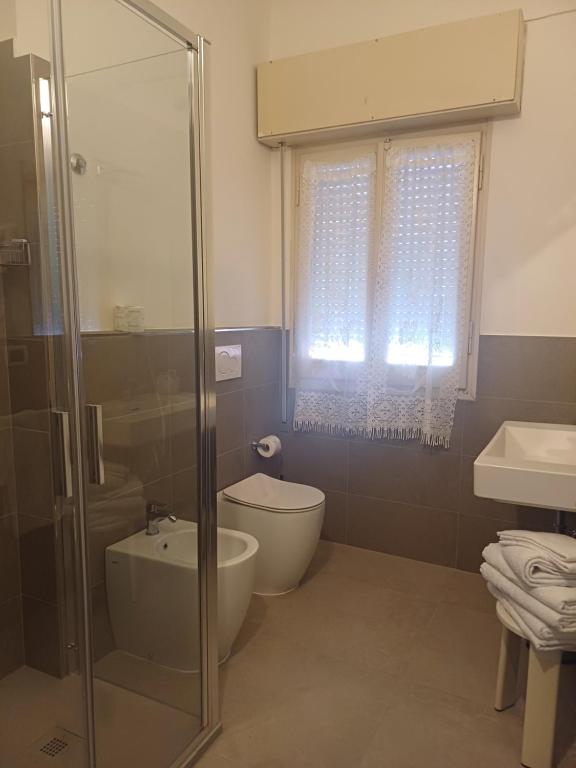 Koupelna v ubytování Hotel Flora