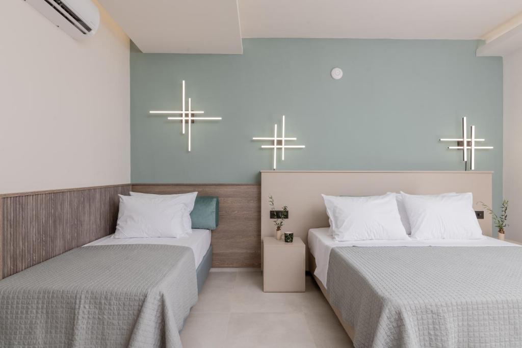Postel nebo postele na pokoji v ubytování Hera Zakynthos Hotel