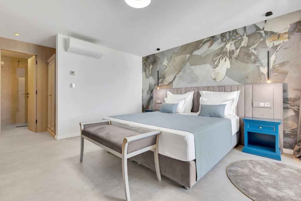 Postel nebo postele na pokoji v ubytování Hotel Laurentum