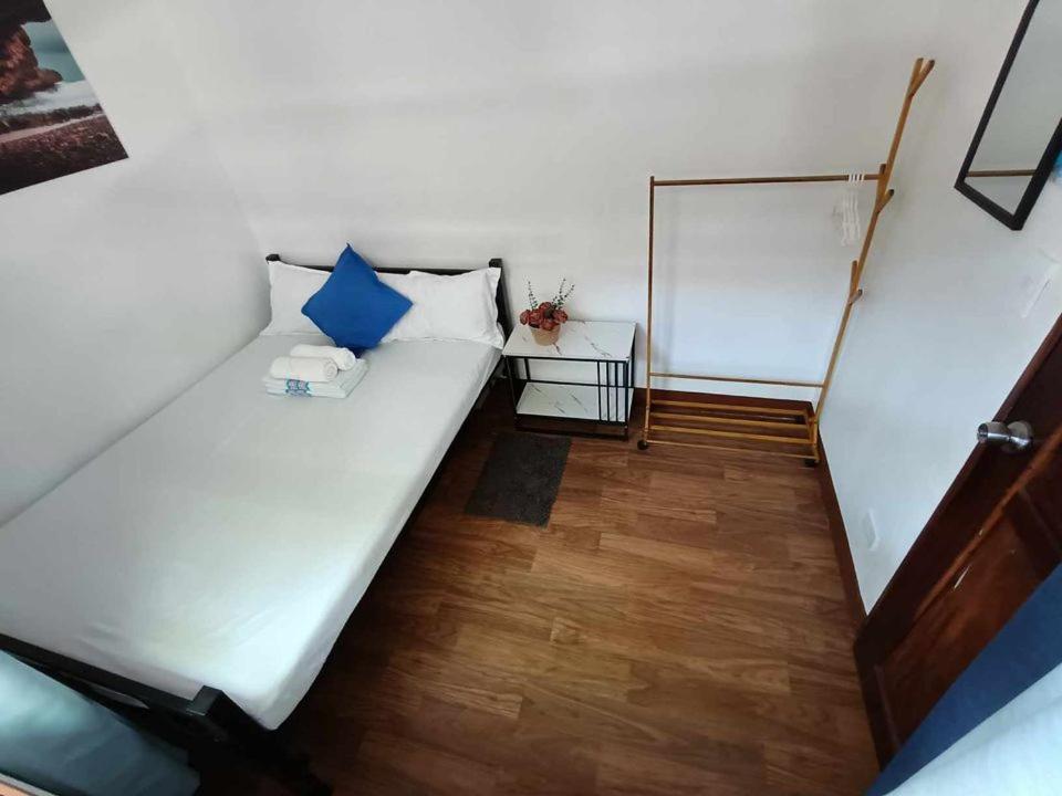 Postel nebo postele na pokoji v ubytování MyGuide Travellers Inn