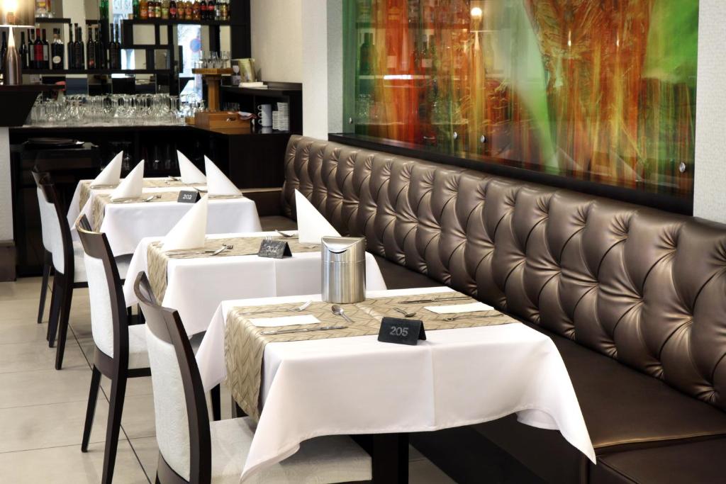 Reštaurácia alebo iné gastronomické zariadenie v ubytovaní Corso Boutique Hotel