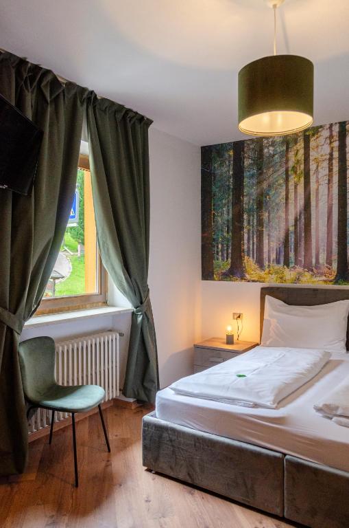 Postel nebo postele na pokoji v ubytování Kyrr Smart Mountain Retreat
