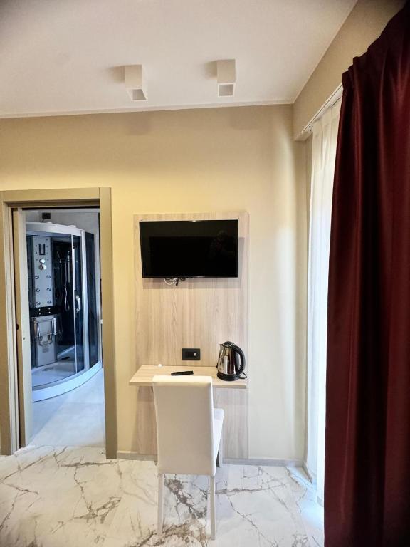 TV a/nebo společenská místnost v ubytování Pasitea B&B
