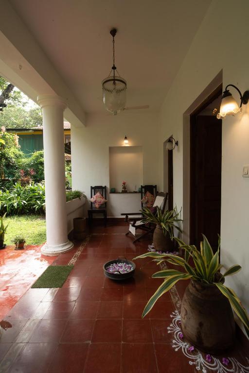 Posezení v ubytování Island House Goa
