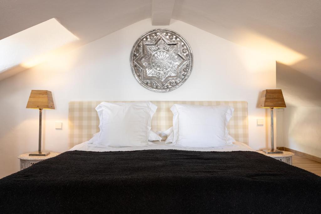 Postel nebo postele na pokoji v ubytování CasaBlu - An Andalusian Boutique Hotel