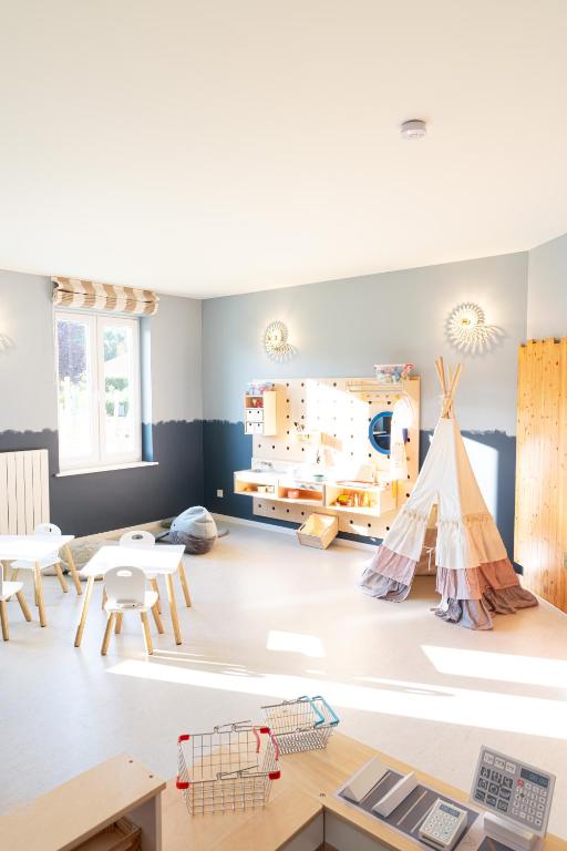 Postel nebo postele na pokoji v ubytování BEECH Resort Boltenhagen