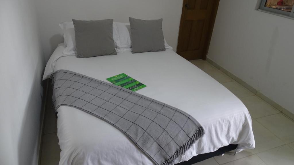 Postel nebo postele na pokoji v ubytování Hotel Casa Finca La Maracuya