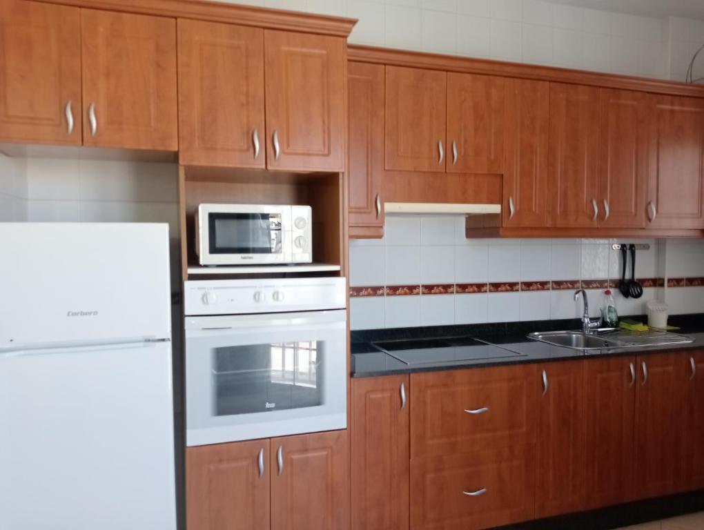 Kuchyň nebo kuchyňský kout v ubytování Casa Alberto
