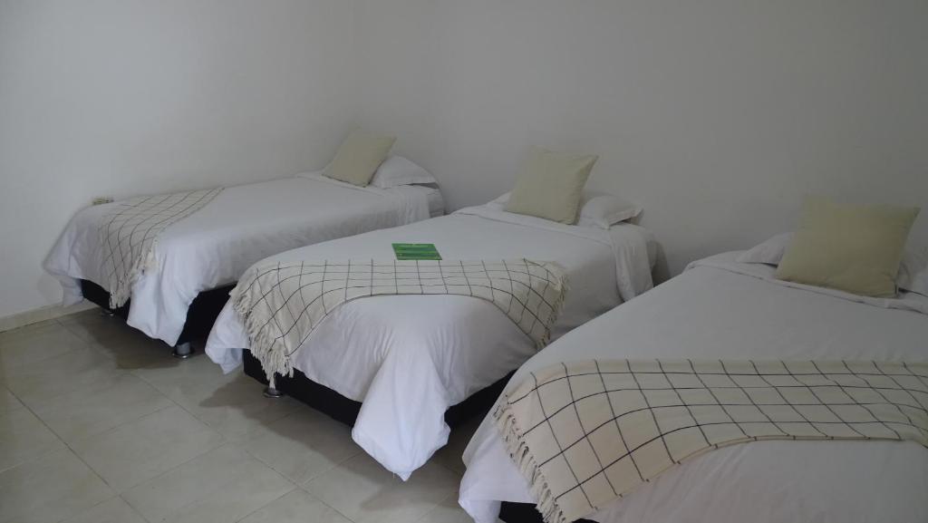 Postel nebo postele na pokoji v ubytování Hotel Casa Finca La Maracuya