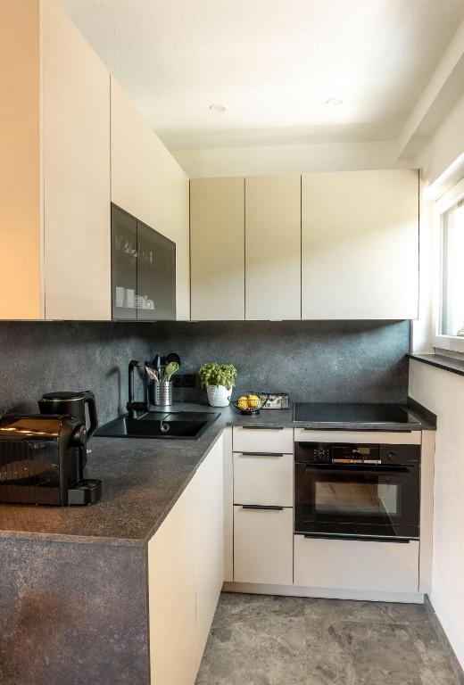 Kuchyň nebo kuchyňský kout v ubytování Ferienwohnung Gföller
