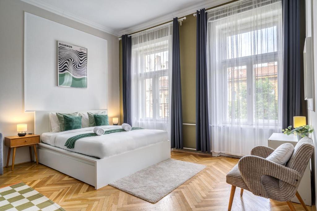 Postel nebo postele na pokoji v ubytování Jókai Hideaway