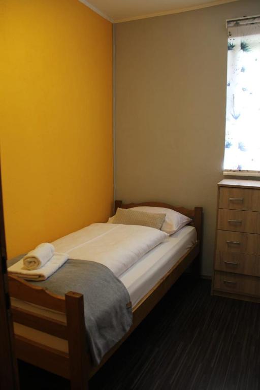 Postel nebo postele na pokoji v ubytování Apartman Lilium