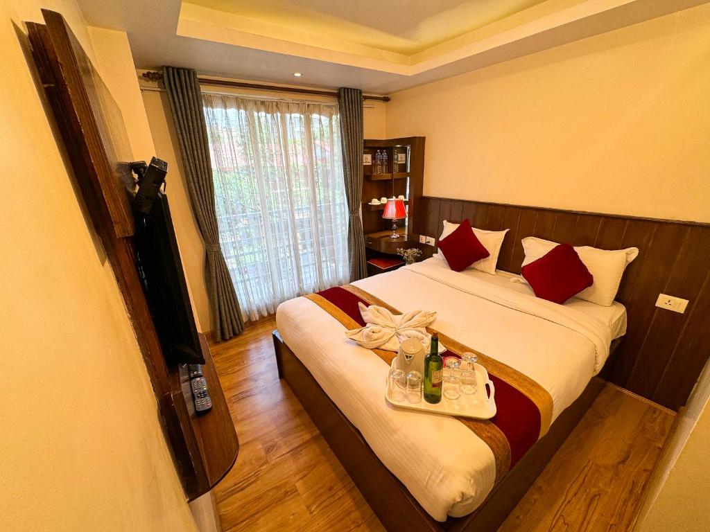 Postel nebo postele na pokoji v ubytování Hotel Abi International