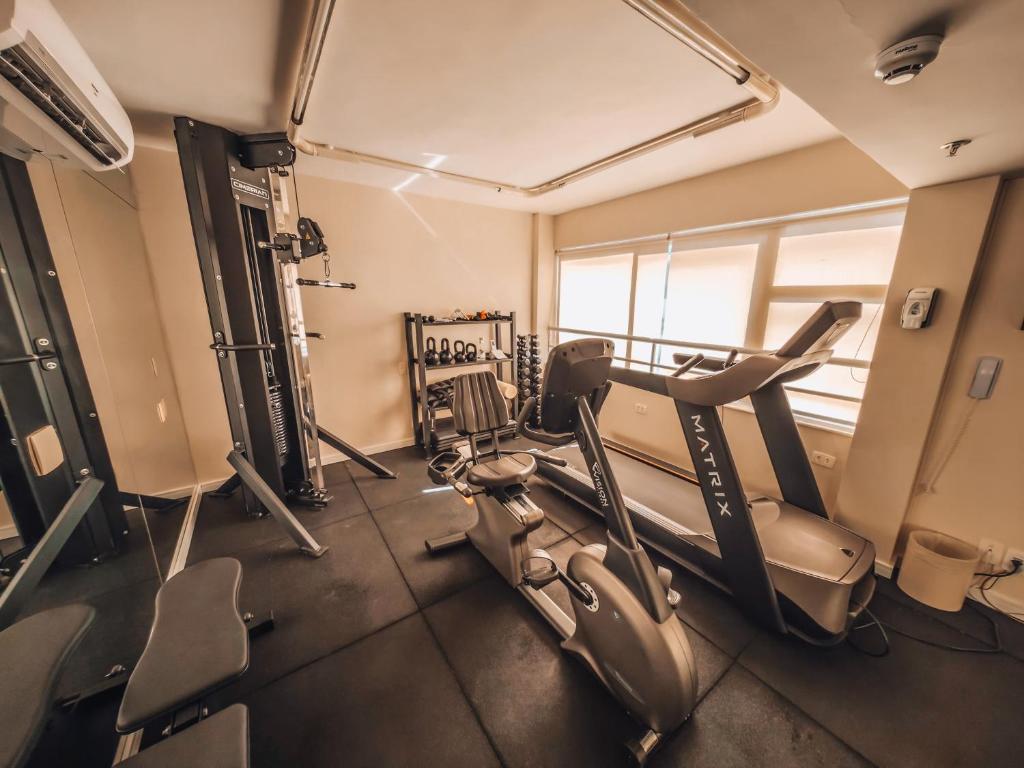 a gym with cardio equipment in a room at Sol Ipanema Hotel in Rio de Janeiro